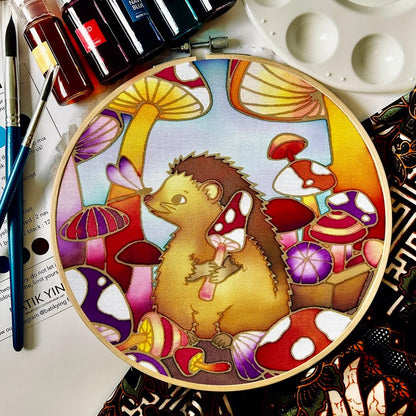Down the Mushroom Hole batik craft kit by Batik Ying – finished hand-painted hedgehog and mushroom design in wooden ring