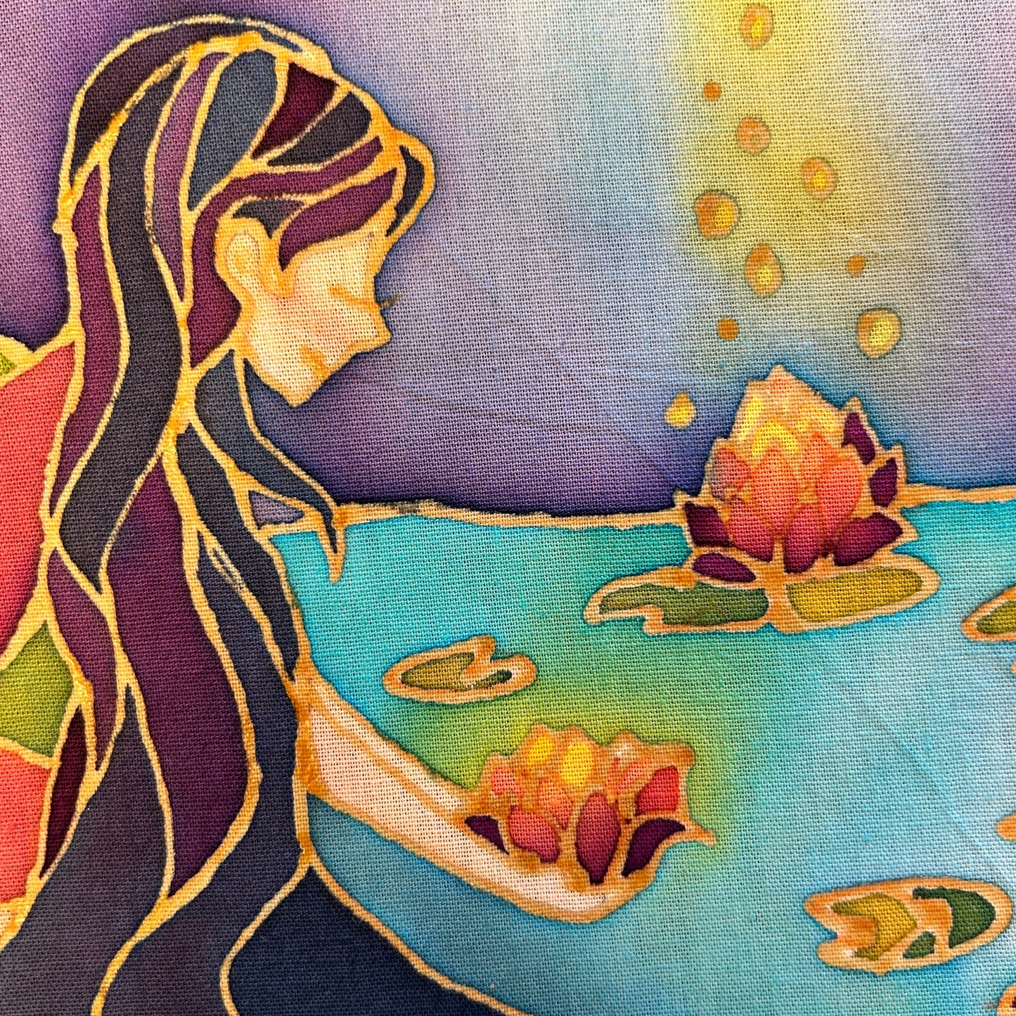 Original Batik Ying contemporary batik art print showing a woman holding a glowing lotus flower by the water