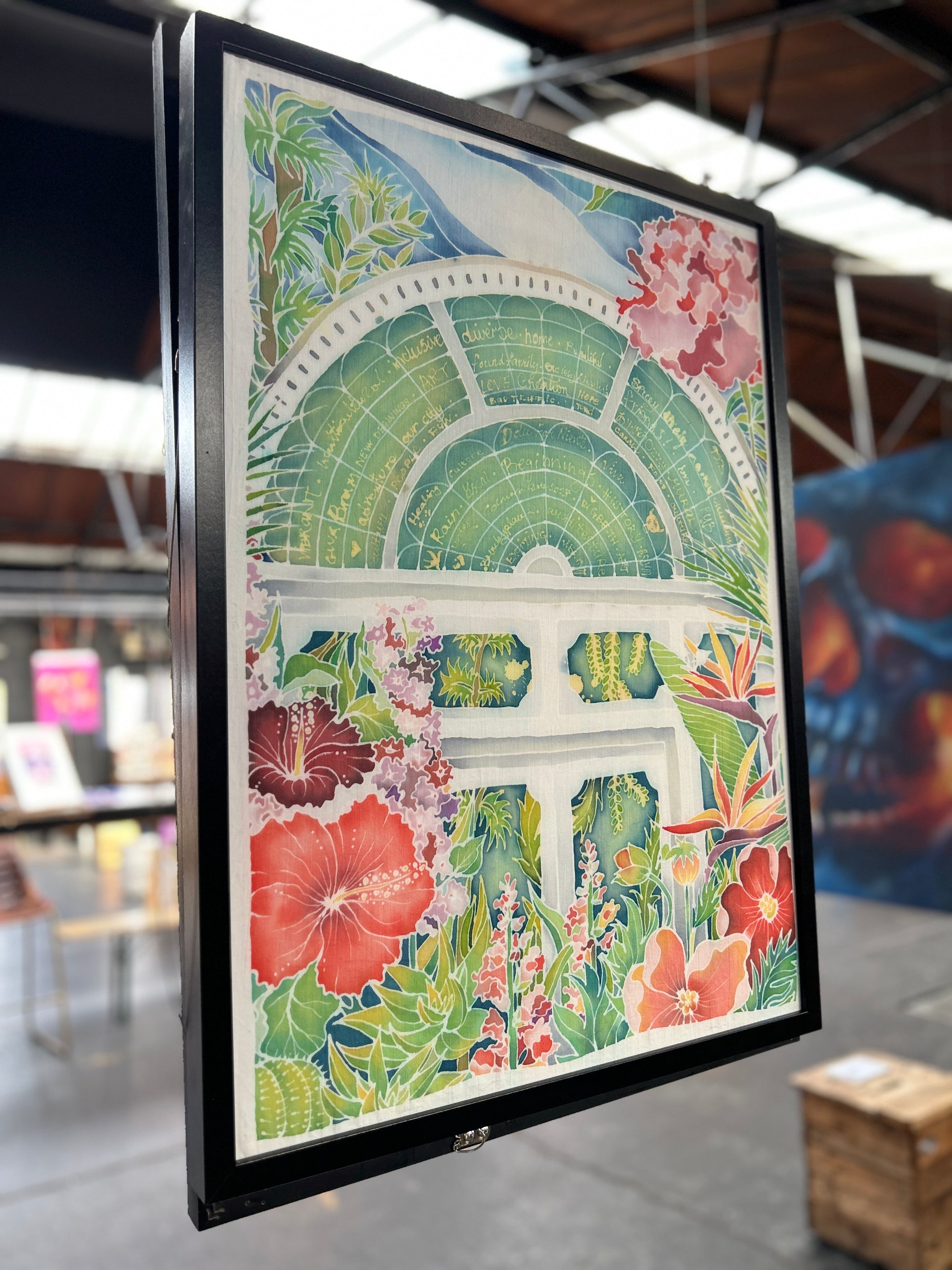 Framed contemporary batik art print featuring vibrant floral and geometric designs by Batik Ying