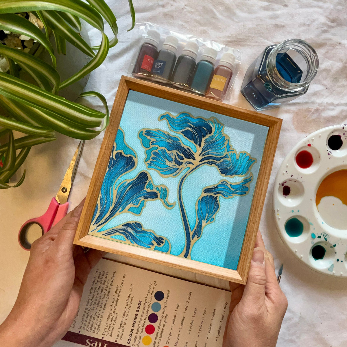 Batik Lamp Kit — Seasons in Colour. Hand-waxed batik cotton panel featuring sweeping botanical foliage in turquoise and navy with gold wax outlines. By Batik Ying.